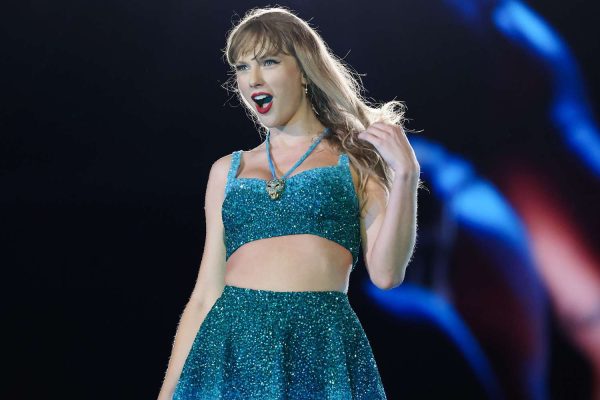 Taylor Swift Swallows a Bug Again and Changes Lyrics on White ‘TTPD’ Dress at Milan Eras Tour Show