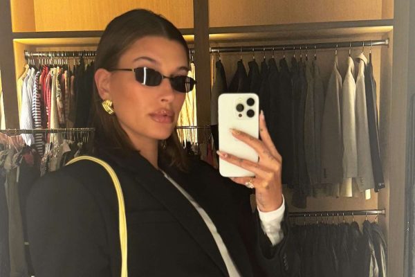 Pregnant Hailey Bieber Shows Off Growing Baby Bump While Posing in White T-Shirt and Jeans