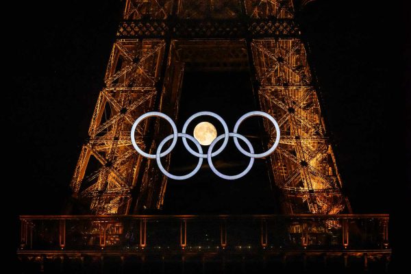 See the Most Amazing Photos of the Full Moon Inside the Paris Olympic Rings on the Eve of the Games