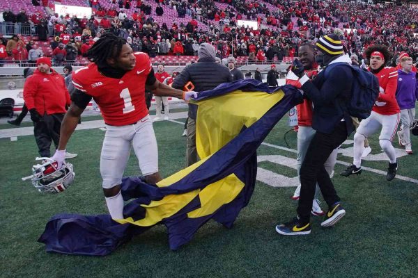 Police Pepper Spray Players After On-Field Brawl Breaks Out at Michigan vs. Ohio State Football Game